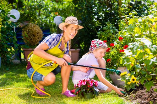 Professional lawn mowing and hedge trimming in North Woolwich garden